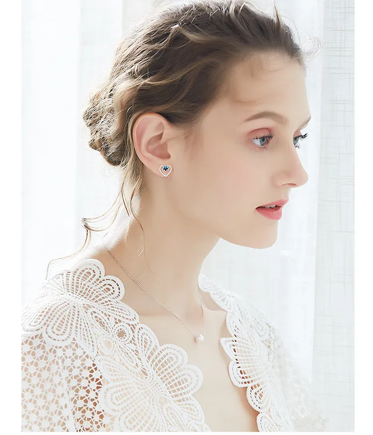 Sterling silver sapphire star in a heart earring